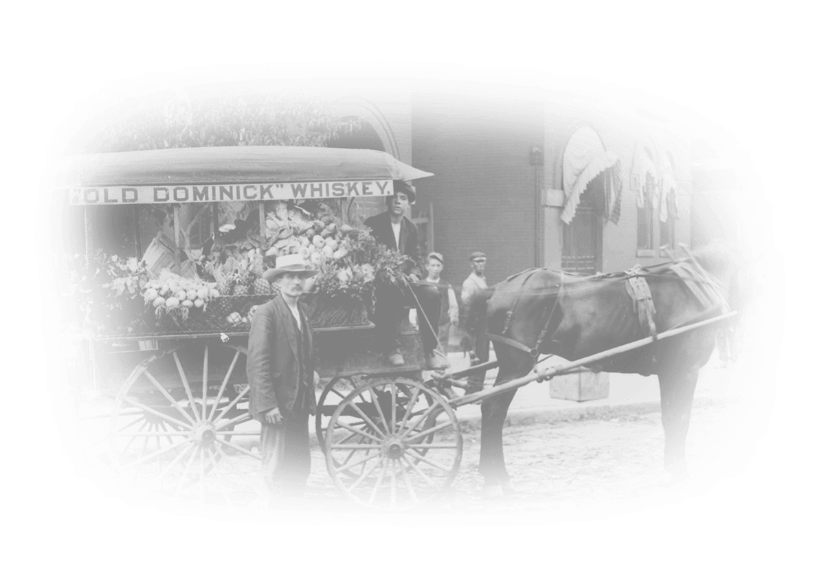 Horse drawn cart with "Old Dominick Whiskey" on the side